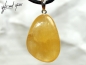 Preview: Orange calcite on cord