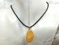 Preview: Orange calcite on cord