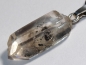 Preview: Rock crystal with bitumen on cord