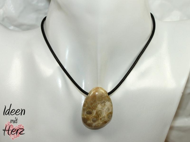 Fossilized coral on cord