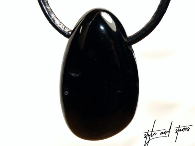 Tektite on cord