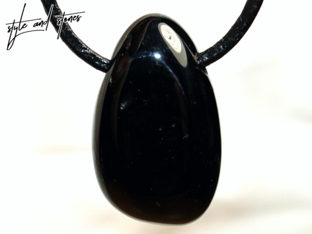 Tektite on cord