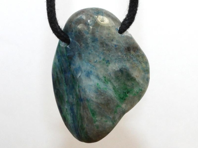 Chrysocolla in quartz on cord