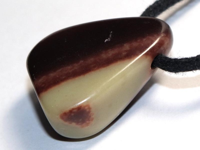 Black banded jasper on cord