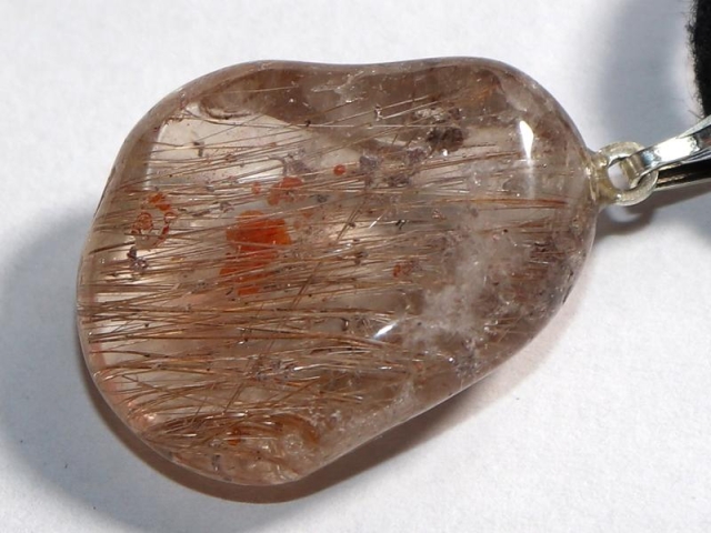 Rutilated quartz on cord