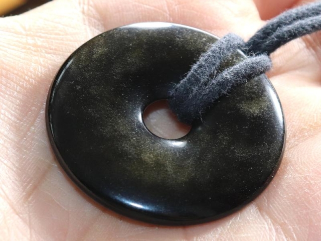 Gold obsidian on cord