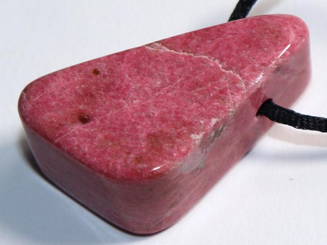 Thulite on cord