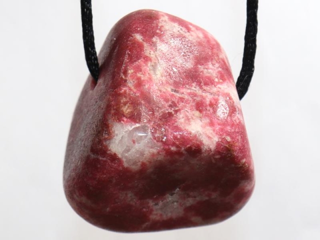 Thulite on cord