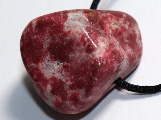 Thulite on cord