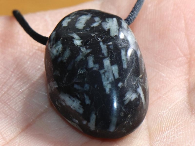 Chrysanthemum stone on cord