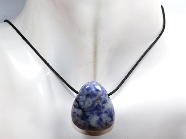 Sodalite feldspar on cord