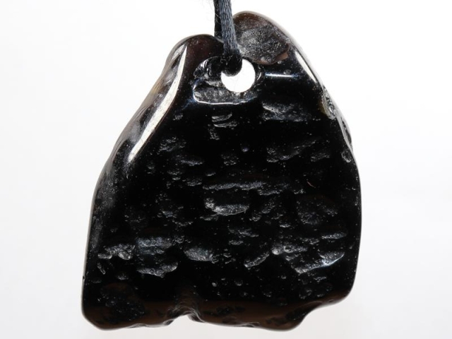 Tektite on cord