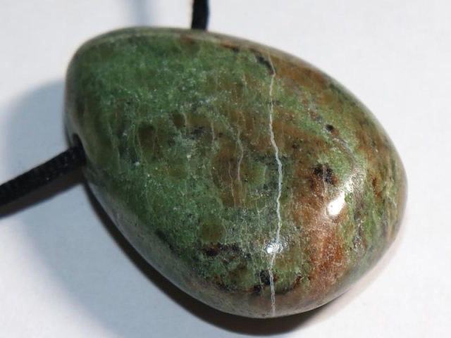 Green opal on cord