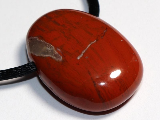 Red jasper on cord