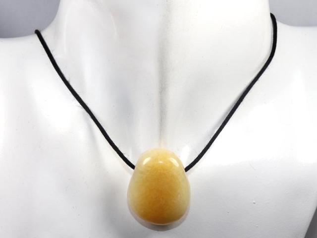 Orange calcite on cord