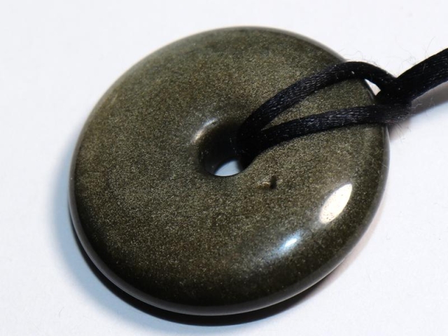 Gold obsidian on cord