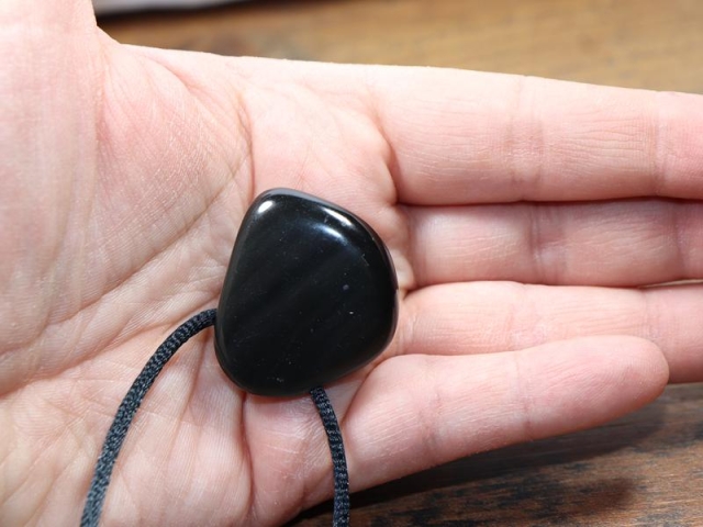 Rainbow obsidian on cord