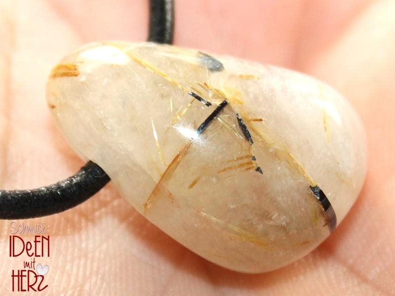 Rutilated quartz on cord