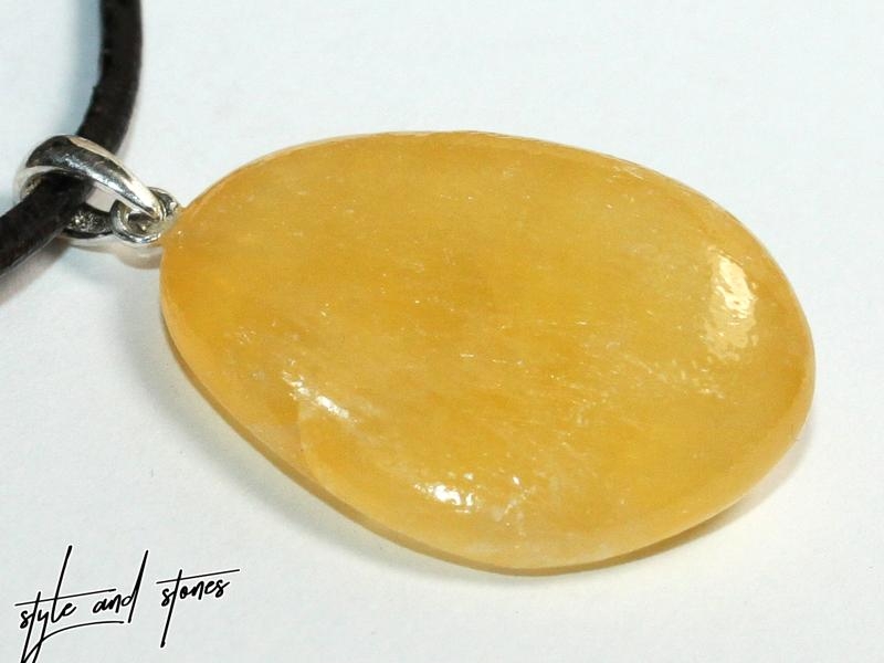 Orange calcite on cord