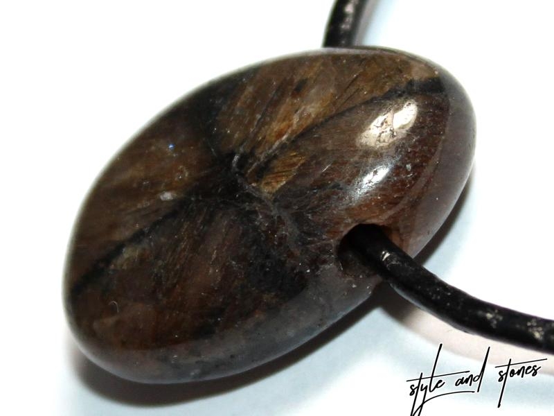 Cross stone on cord