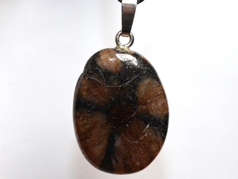 Cross stone on cord