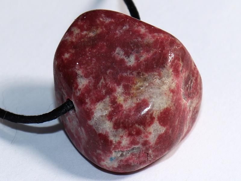 Thulite on cord