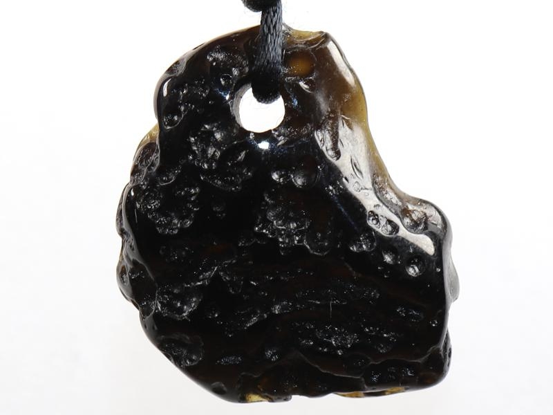 Tektite on cord